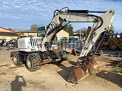 Terex TW110 with two-piece offset boom and 3 buckets